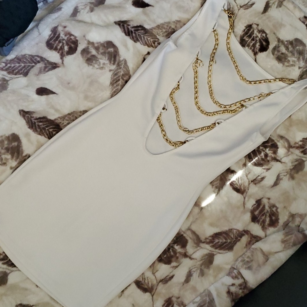 High front dress and gold chained low back